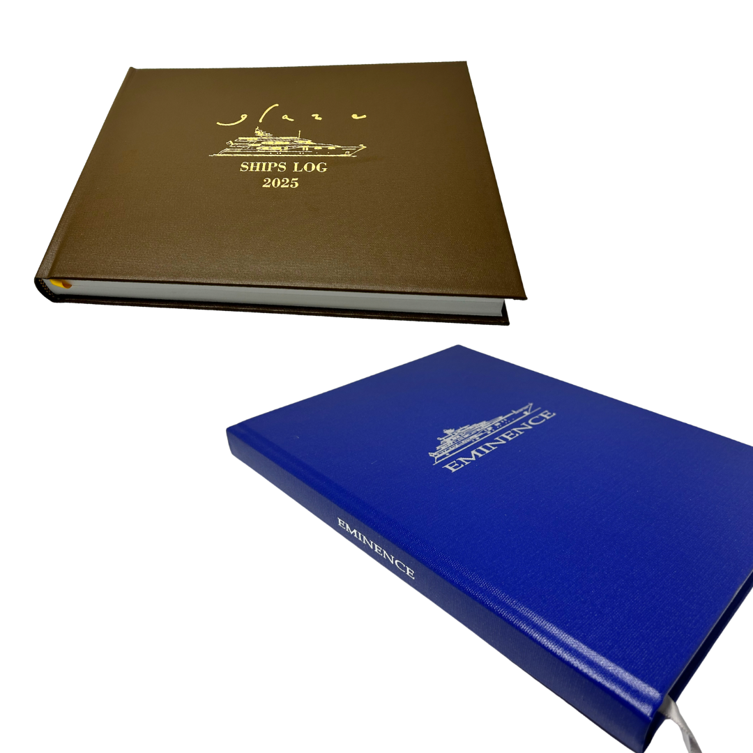 Two custom made yacht log books.